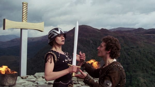 Gustav Mahler hands a sword to Cosima Wagner in Ken Russell's 1974 film Mahler.